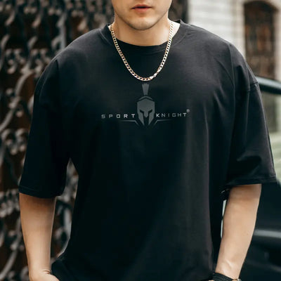 Schwarzes Oversize T-Shirt mit Sport Knight® Logo für Herren