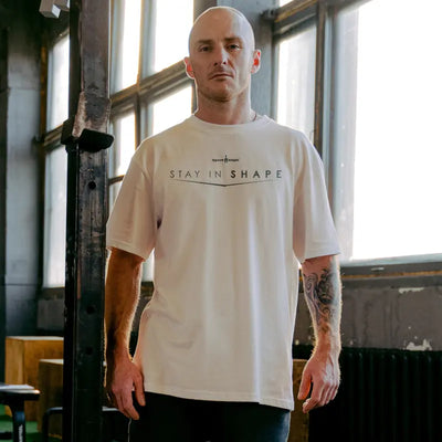 Weißes Oversize T-Shirt mit Sport-Knight® Logo und Schriftzug Stay für Herren